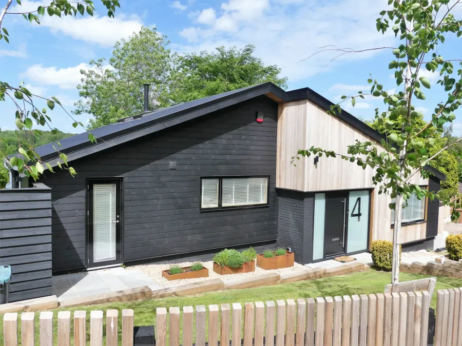 Single-storey in-law garden suite with private entrance and garden path in a Toronto backyard
