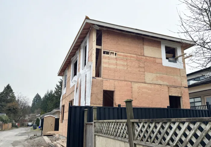 Two-storey laneway suite with laneway access behind a Toronto home
