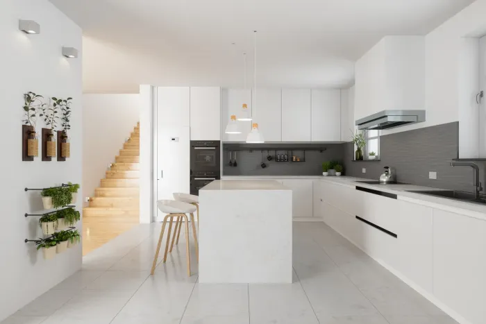 Accessible kitchen with integrated appliances and reachable storage inside a barrier-free garden suite
